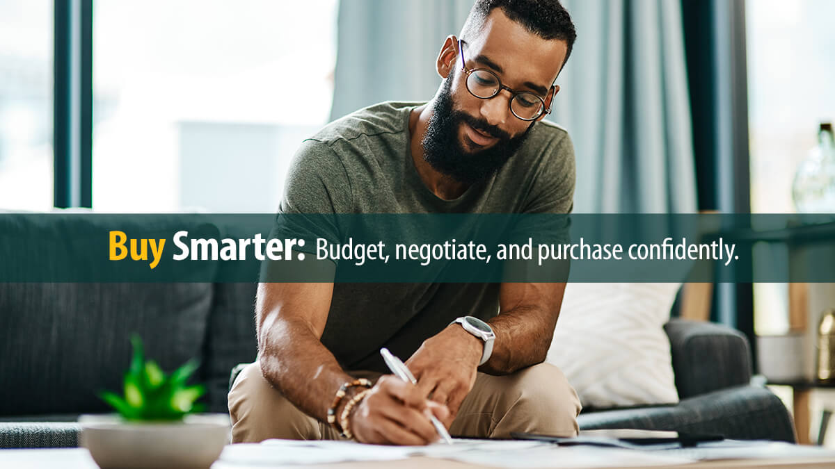 Young man going over his finances at home.